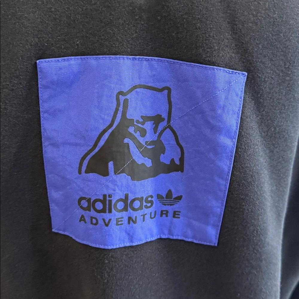 Adidas Adventure Black Hoodie with Blue‎ Patch